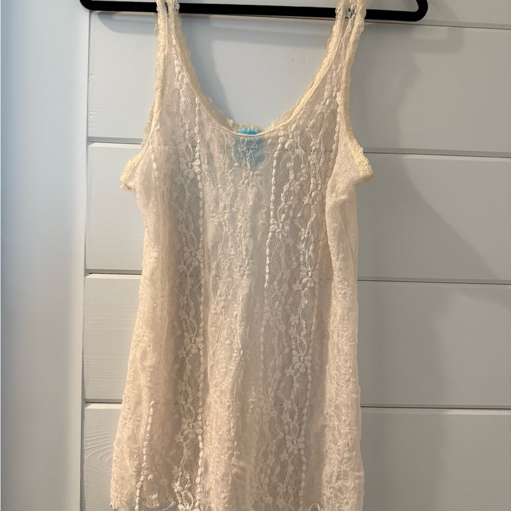 happening in the present Cream Lace Camisole